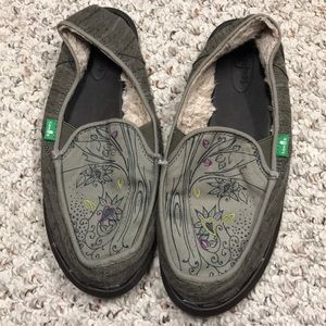 Barely worn fur-lined SANUK slip ons